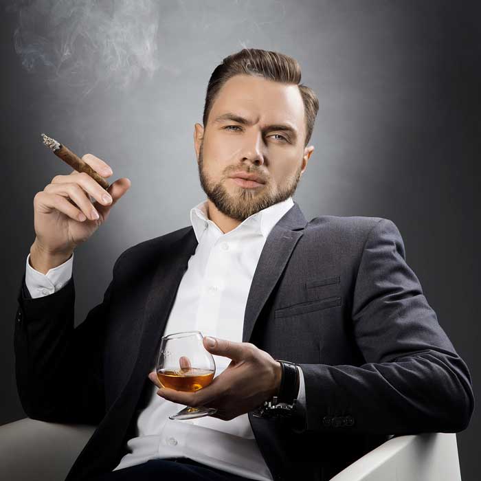 Good Looking man smoking cigar